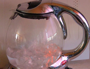 Copper-topped water kettle with kettle fur collector inside